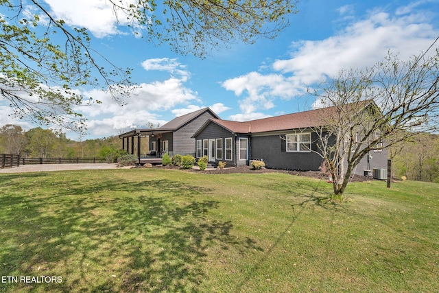 544 Mill Creek Rd, Andersonville, TN 37705 - view of front of house with central AC, a front lawn, and fence