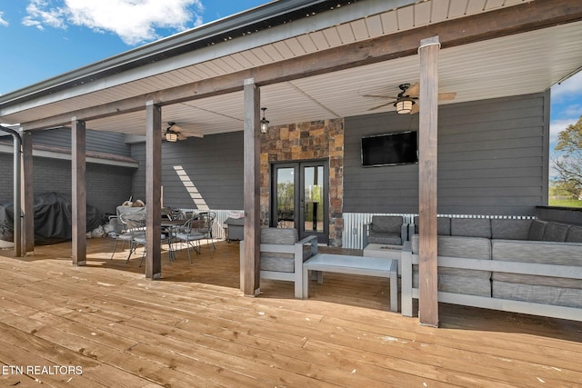 544 Mill Creek Rd, Andersonville, TN 37705 - wooden deck with french doors, a ceiling fan, an outdoor hangout area, grilling area, and outdoor dining space