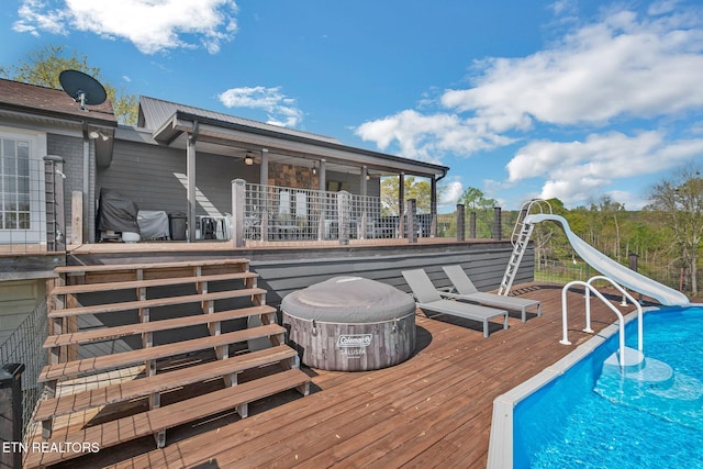 544 Mill Creek Rd, Andersonville, TN 37705 - outdoor pool with a water slide, stairs, and a deck