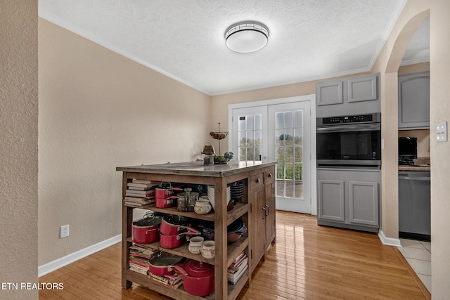 544 Mill Creek Rd, Andersonville, TN 37705 - kitchen featuring light wood-type flooring, stainless steel appliances, open shelves, and ornamental molding