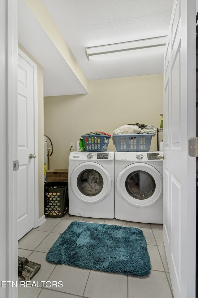 544 Mill Creek Rd, Andersonville, TN 37705 - laundry room with tile patterned flooring, washer and clothes dryer, and laundry area