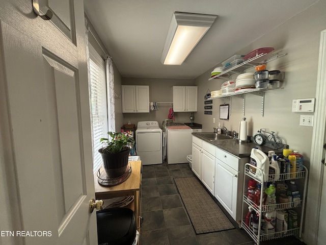 2525 Virgil Rushing Way, Knoxville, TN 37914 - laundry room featuring washer and clothes dryer, a sink, and cabinet space