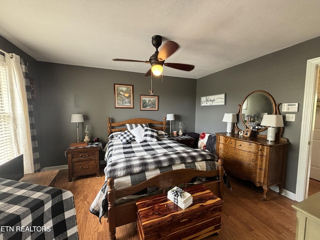 2525 Virgil Rushing Way, Knoxville, TN 37914 - bedroom with baseboards, a ceiling fan, and wood finished floors