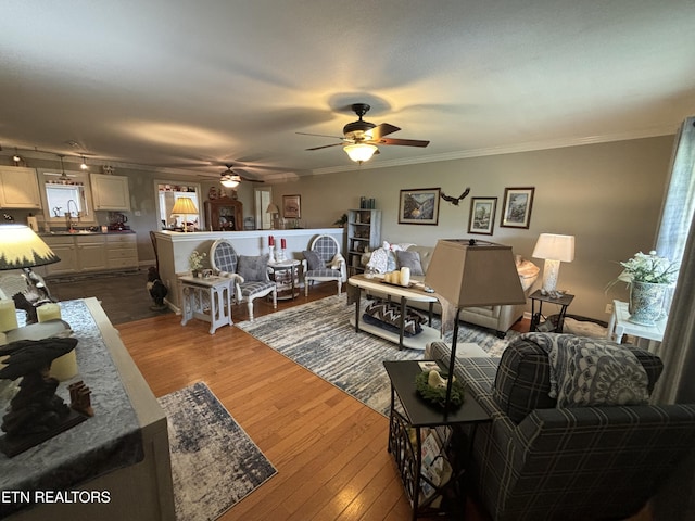 2525 Virgil Rushing Way, Knoxville, TN 37914 - living area featuring ceiling fan, ornamental molding, and wood finished floors
