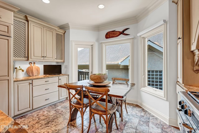 dining area featuring baseboards, ornamental molding, recessed lighting, and stone finish flooring