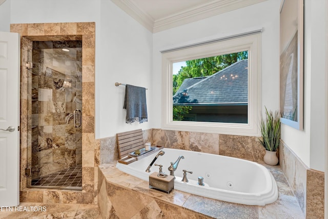 full bathroom with crown molding, a stall shower, and a jetted tub