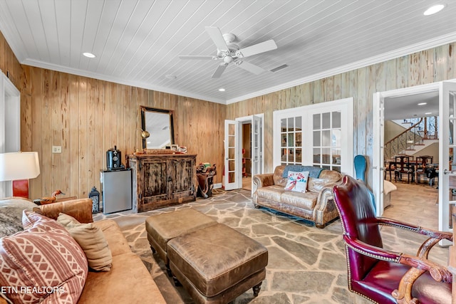 living room featuring ornamental molding, french doors, ceiling fan, and visible vents