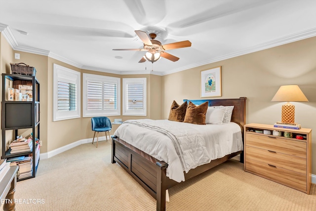 bedroom featuring light colored carpet, ornamental molding, baseboards, and ceiling fan