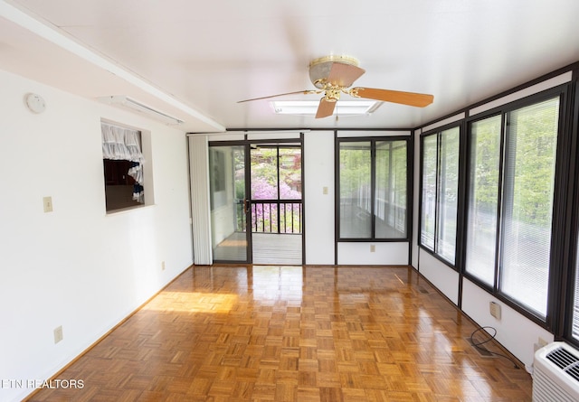 23 Windhaven Ln, Oak Ridge, TN 37830 - unfurnished sunroom with baseboards and a wall unit AC