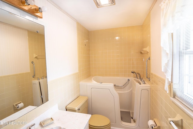 23 Windhaven Ln, Oak Ridge, TN 37830 - bathroom with a bath, toilet, tile walls, visible vents, and vanity