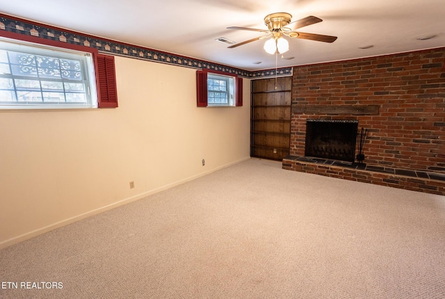 23 Windhaven Ln, Oak Ridge, TN 37830 - unfurnished living room with visible vents, baseboards, carpet, and ceiling fan