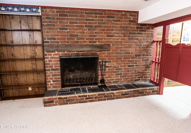 23 Windhaven Ln, Oak Ridge, TN 37830 - room details featuring a fireplace, wood walls, and carpet