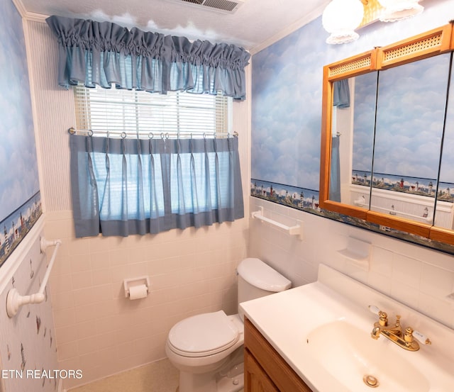 23 Windhaven Ln, Oak Ridge, TN 37830 - half bath with tile walls, wallpapered walls, a wainscoted wall, and toilet