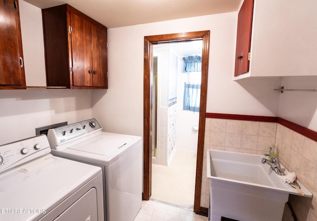 23 Windhaven Ln, Oak Ridge, TN 37830 - laundry room with washer and dryer, cabinet space, and a sink