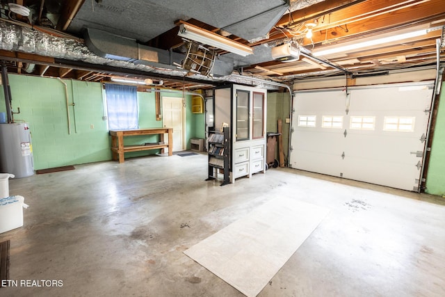 23 Windhaven Ln, Oak Ridge, TN 37830 - garage featuring water heater and a garage door opener