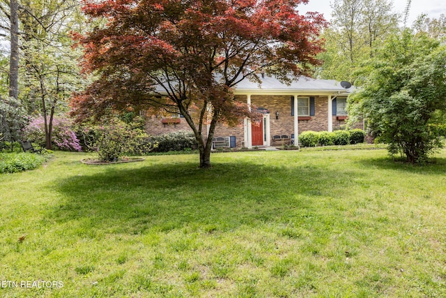 23 Windhaven Ln, Oak Ridge, TN 37830 - raised ranch with a front lawn and brick siding