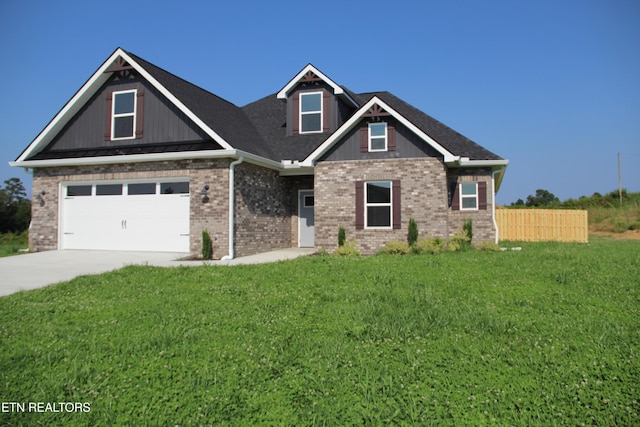 240 Lakeside Meadows Cir, Madisonville, TN 37354 - craftsman-style house featuring driveway, a garage, and brick siding