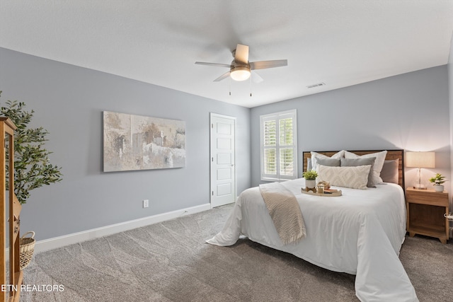 bedroom featuring baseboards, visible vents, ceiling fan, and carpet