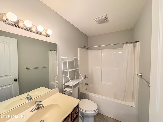 bathroom with visible vents, shower / tub combo with curtain, toilet, and vanity