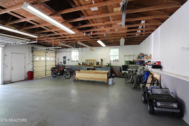 garage with a workshop area