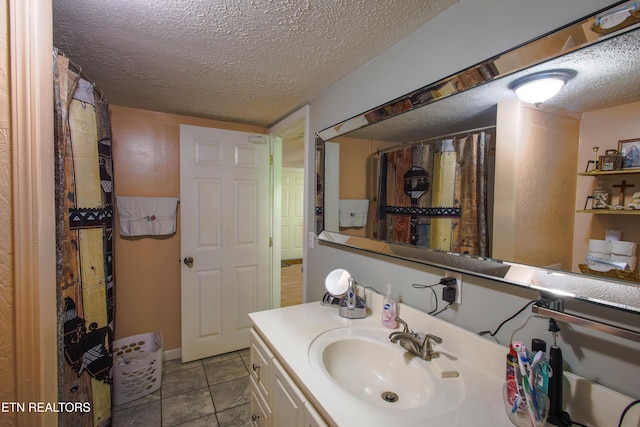 124 E Wadsworth Cir, Oak Ridge, TN 37830 - full bathroom featuring vanity, tile patterned flooring, and a textured ceiling