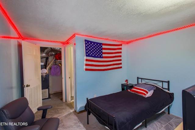 124 E Wadsworth Cir, Oak Ridge, TN 37830 - bedroom with visible vents and a textured ceiling
