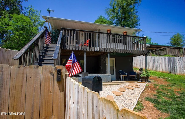124 E Wadsworth Cir, Oak Ridge, TN 37830 - back of house featuring fence private yard, a wooden deck, and stairway