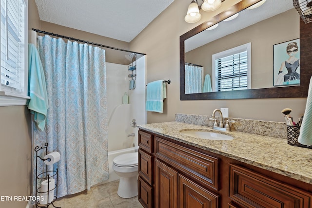 bathroom with toilet, tile patterned floors, shower / tub combo, and vanity