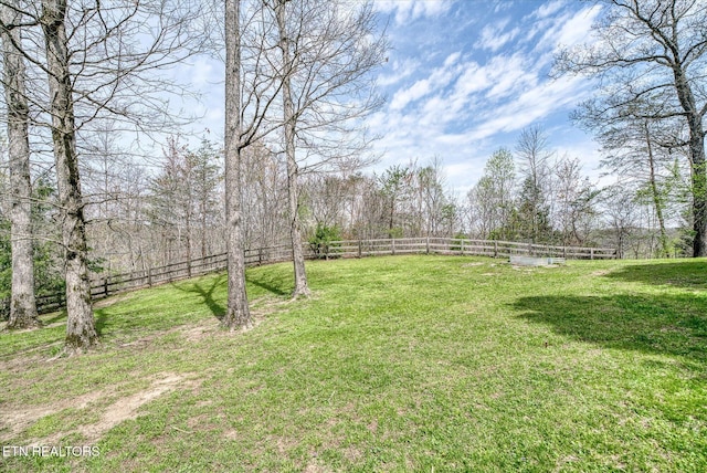 view of yard with fence