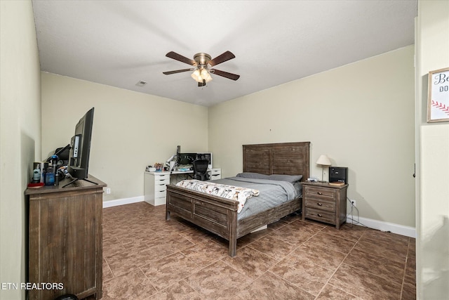 bedroom featuring baseboards and a ceiling fan