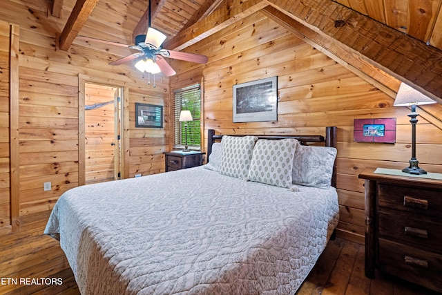 bedroom with wooden walls, wooden ceiling, vaulted ceiling with beams, and wood-type flooring