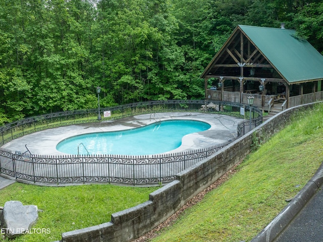 144 Timberwinds Way, Townsend, TN 37882 - view of swimming pool featuring fence and a forest view