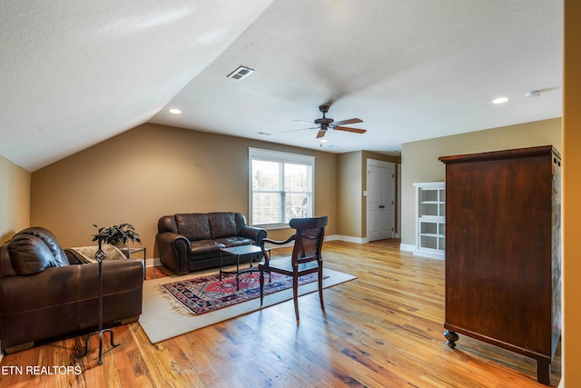 11969 Lakehurst Ln, Knoxville, TN 37934 - living area featuring light wood finished floors, a ceiling fan, lofted ceiling, baseboards, and recessed lighting