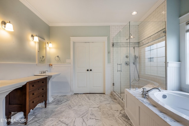 11969 Lakehurst Ln, Knoxville, TN 37934 - bathroom with a stall shower, a bath, ornamental molding, vanity, and wainscoting