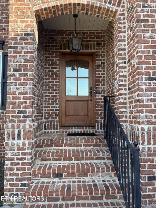 11969 Lakehurst Ln, Knoxville, TN 37934 - property entrance featuring brick siding