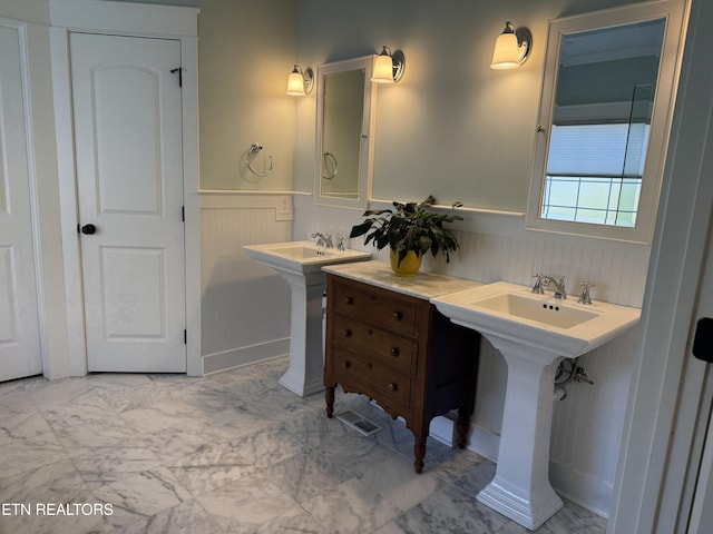 11969 Lakehurst Ln, Knoxville, TN 37934 - bathroom featuring a wainscoted wall and marble finish flooring