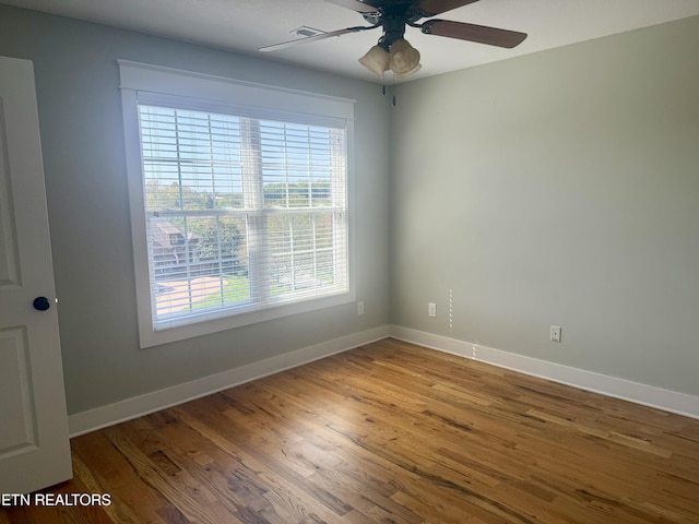 11969 Lakehurst Ln, Knoxville, TN 37934 - spare room with plenty of natural light, wood finished floors, baseboards, and a ceiling fan
