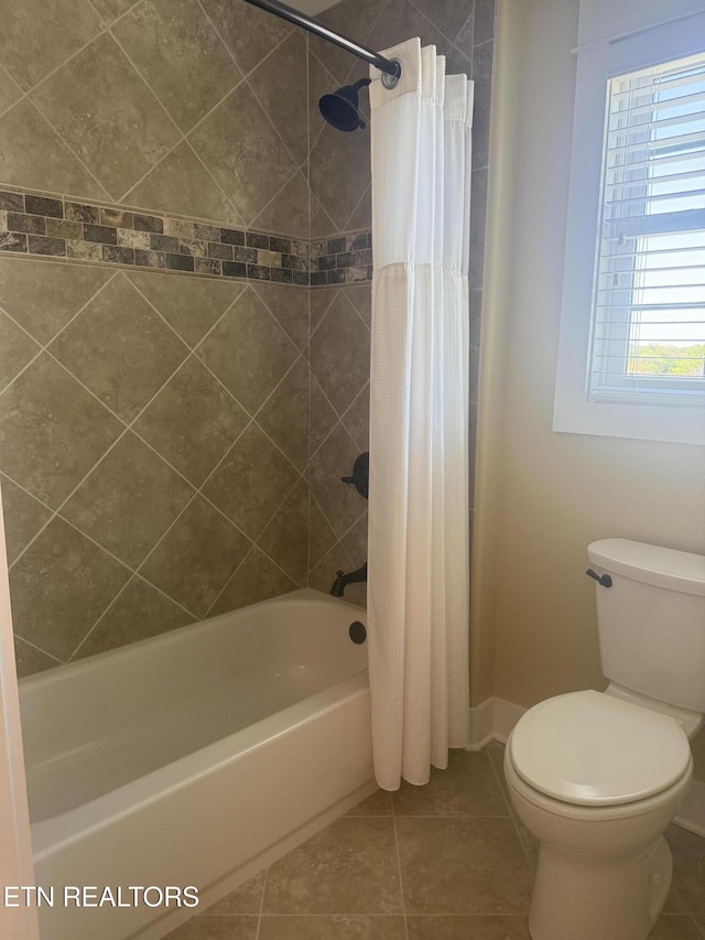 11969 Lakehurst Ln, Knoxville, TN 37934 - bathroom featuring toilet, shower / bathtub combination with curtain, tile patterned floors, and baseboards