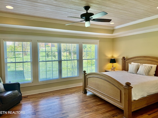11969 Lakehurst Ln, Knoxville, TN 37934 - bedroom featuring wood finished floors, baseboards, a tray ceiling, ornamental molding, and a ceiling fan