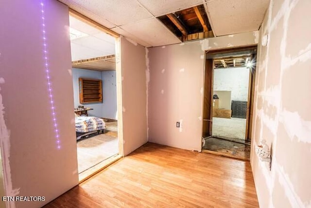 hall featuring wood finished floors