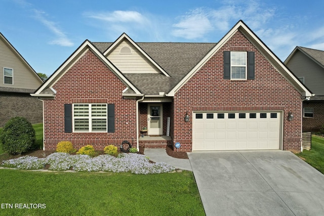 3317 Parrish Hill Ln, Knoxville, TN 37938 - view of front facade with concrete driveway, brick siding, roof with shingles, and a front yard