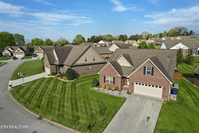3317 Parrish Hill Ln, Knoxville, TN 37938 - traditional-style house with concrete driveway, a front lawn, an attached garage, brick siding, and a residential view