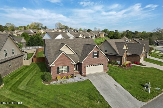 3317 Parrish Hill Ln, Knoxville, TN 37938 - view of front of house with brick siding, a residential view, driveway, and a front yard