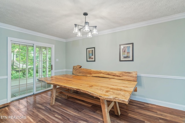 1109 Greywood Dr, Knoxville, TN 37923 - dining space featuring baseboards, a chandelier, wood finished floors, ornamental molding, and a textured ceiling