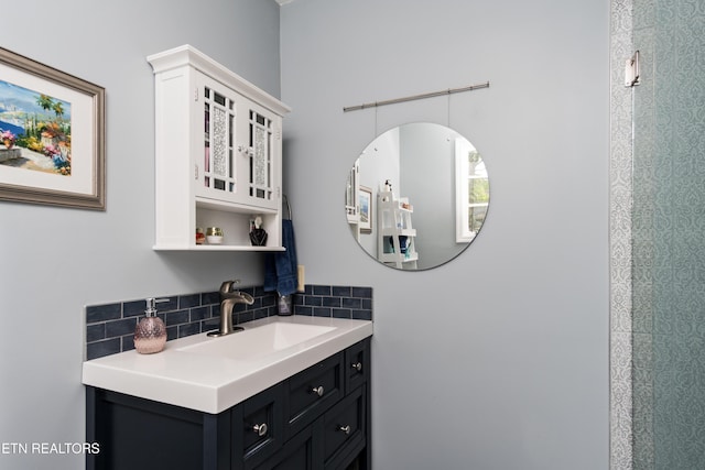 bathroom with backsplash and vanity