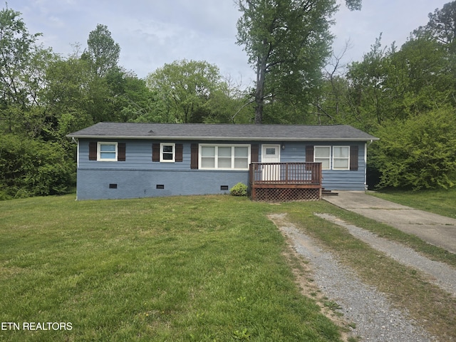 single story home featuring a wooden deck, roof with shingles, crawl space, and a front yard