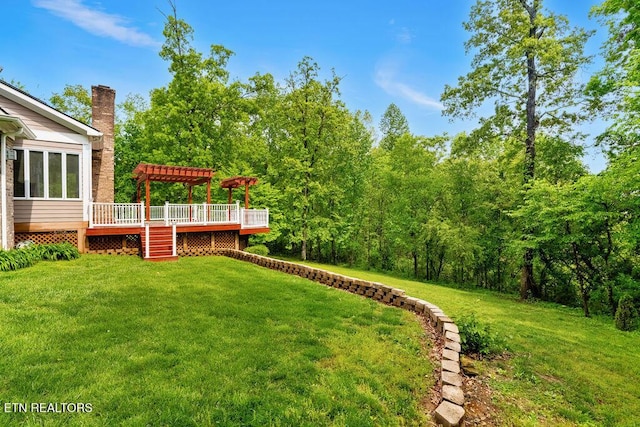 view of yard featuring a wooden deck, stairs, and a pergola