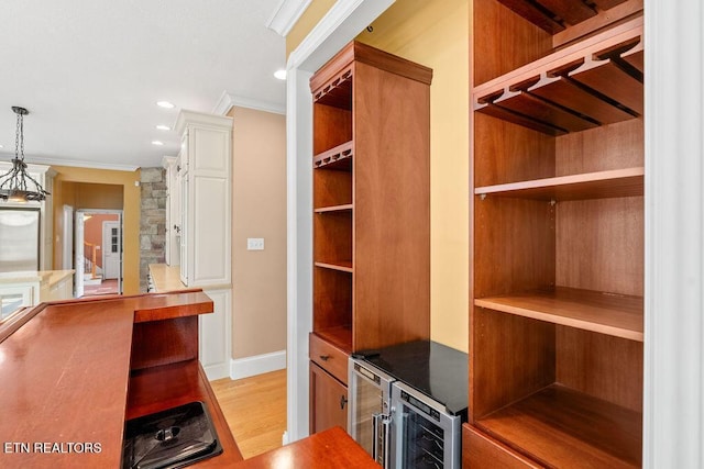 walk in closet featuring light wood finished floors