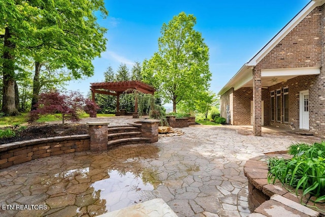 view of patio featuring a pergola