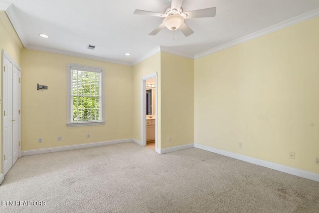 interior space with crown molding, recessed lighting, visible vents, and baseboards